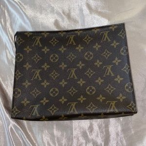 Used Louis Vuitton hand bag/ toiletry bag